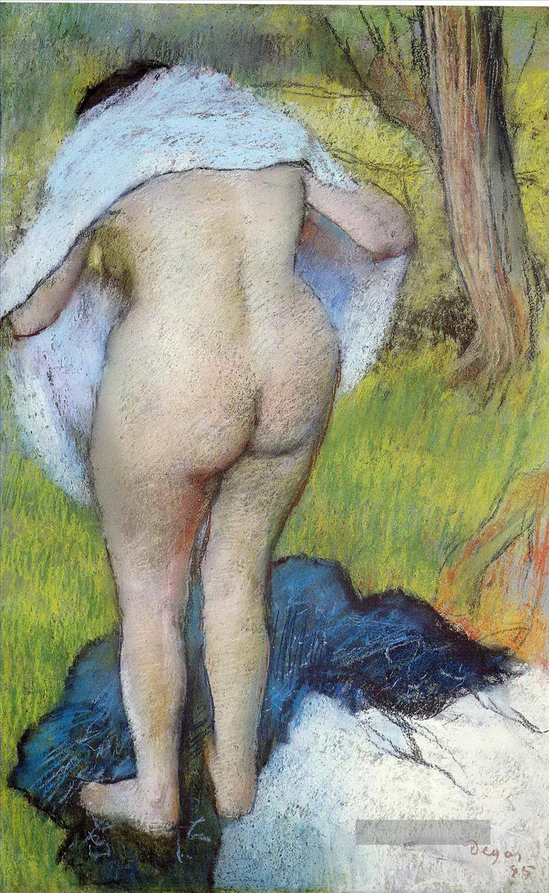 nackte Frau zieht ihre Kleider 1885 Edgar Degas Ölgemälde